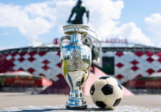 June 14, 2021, Berlin, Germany. European Football Cup (Henri Delaunay Cup) against the backdrop of a modern stadium.