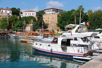 various pleasure boats and yachts in the seaport of the Mediterranean sea