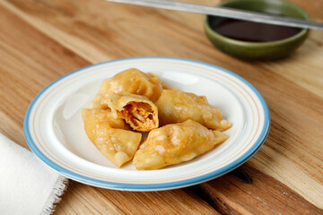 Kimchi Mandu, Dumpling Skin Stuffed with Meat and Korean Kimchi, Deep Fried.