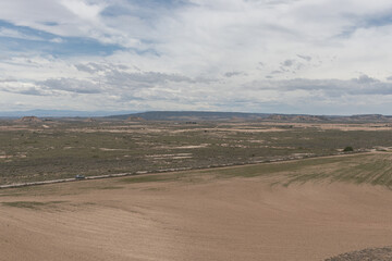 Badlans of Navarre (Bardenas Reales de Navarra) dessert in the middle of Spain. Aerial panorama.