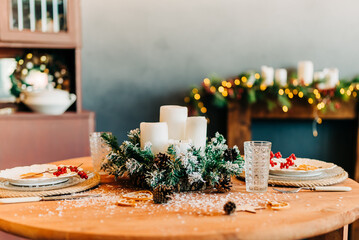 Traditionally decorated christmas table with candles