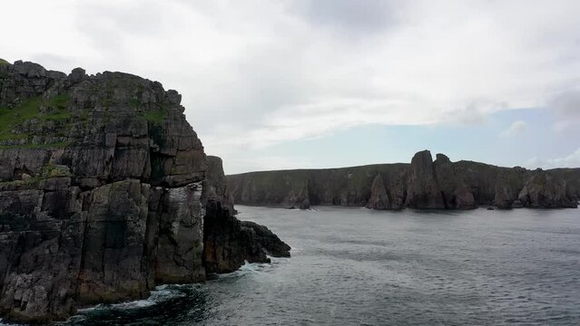The cliffs and sea stacks at Port Challa on Tory Island, County Donegal, Ireland