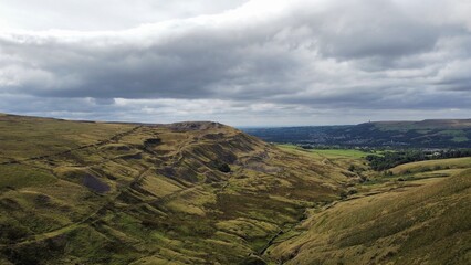 Fototapeta premium Aerial view of rural farmland with fields and grassland. Taken in Lancashire England. 