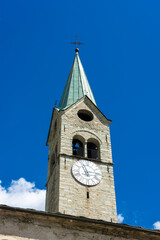 Fototapeta na wymiar Belltower of the church of Gressoney, Aosta Valley, Italy