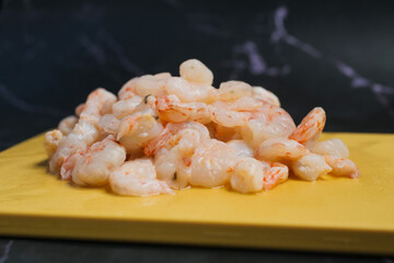 close up of raw king prawn on table.