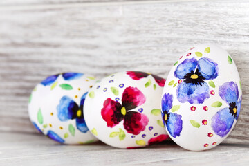 Easter eggs on a white wooden table