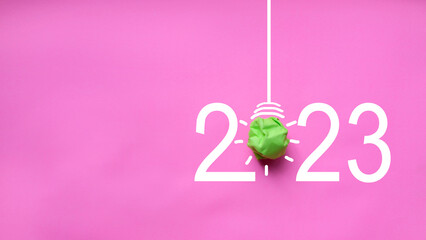 2023 Green paper bulb, new year innovative business vision and resolution concept, success concept