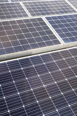 Solar panels on a flat roof.