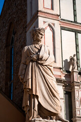 Marble statue of Dante Alighieri at the Santa Croce Square, Florence, Italy