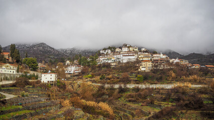 Cyprus city in rainy day with clouds