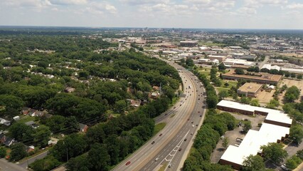 Fototapeta premium City skyline of Richmond, Virginia with office buildings, roads, urban neighborhoods