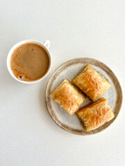 top view coffee and delicious turkish dessert baklava