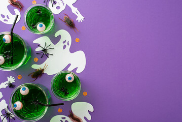 Halloween concept. Top view photo of green floating eyes punch skeleton ghost silhouettes spiders...