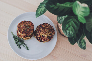 Small homemade rosti pancakes with herbs