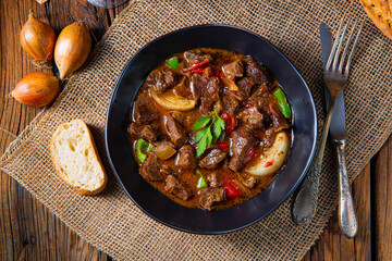 classic beef goulash with peppers and onions