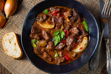 classic beef goulash with peppers and onions
