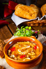 Spicy tripe soup with red paprika.