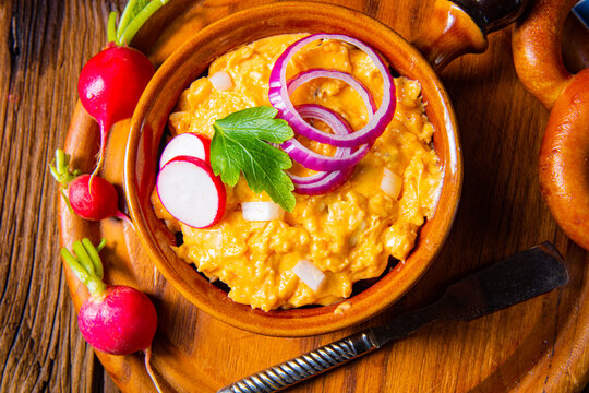 rustic Bavarian obazda with radishes and onions