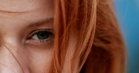 Contemplative meditative redhead woman, eyes closed, girl opening eyes