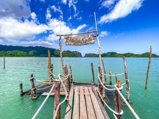 Wooden bridge at Ao Talet or Ta Lhet bay, Nakhon si Thammarat, Thailand