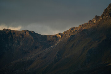 beautiful sunrise with autumnal colors in the alps, the hohe tauern national park in austria