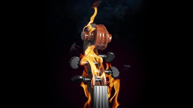 Burning violin scroll isolated on black. Slow motion fire and smoke.