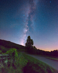 The milky way shines over the Blue Ridge Parkway and Humpback Rocks