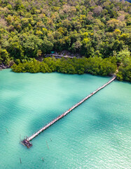 Fototapeta premium Wooden bridge at Ao Talet or Ta Lhet bay, Nakhon si Thammarat, Thailand