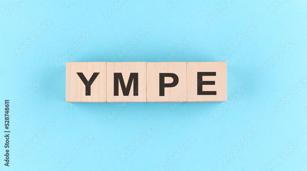 Aufkleber wooden cube block with text ympe on the blue background