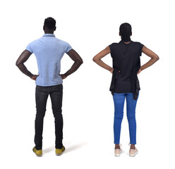 rear view of a couple standing over white background