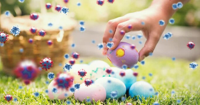 Animation of virus cells over hand with easter eggs