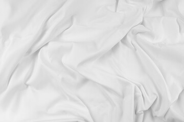 White fabric. luxurious white fabric texture background. Creases of satin, silk, and cotton..