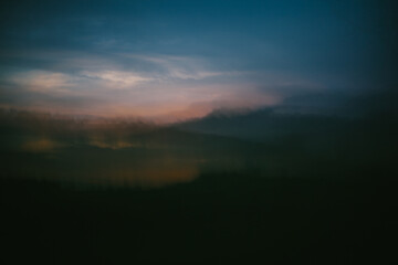 Fototapeta na wymiar Moody Abstract Mountain Landscape at Sunset