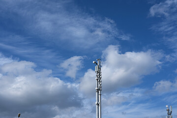 Obraz premium Telecommunications tower of 4G and 5G cellular communications. Transmission of antenna communication. The base station of the cell phone signal. Telecommunication equipment radio networks with radio