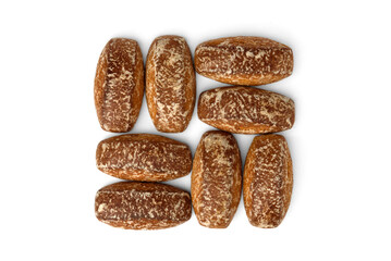 Pile of honey gingerbread cookies isolated on white background.