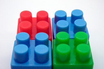 Plastic building toy blocks isolated on white background