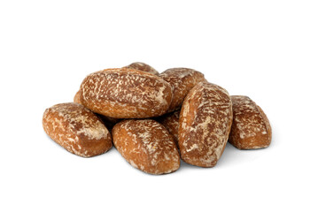 Pile of honey gingerbread cookies isolated on white background.