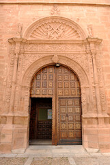 Fototapeta na wymiar Plateresque doorway of the Church of San Andres (Saint Andrew) in Villanueva de los Infantes, Ciudad Real province, Castilla la Mancha, Spain