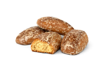 Pile of honey gingerbread cookies isolated on white background.