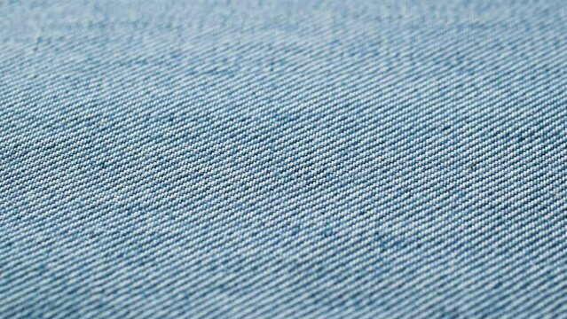Blue denim texture closeup. Grunge denim background