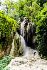 Fototapeta na wymiar Clocota Waterfall, located on the edge of the spa resort Geoagiu-Bai in Hunedoara County and is one of the most beautiful in the county. Romania.