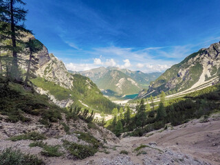 Fototapeta na wymiar The amazing high mountain peaks of the Italian Dolomites and the surrounding nature