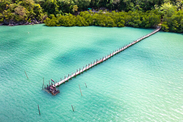 Wooden bridge at Ao Talet or Ta Lhet bay, Nakhon si Thammarat, Thailand
