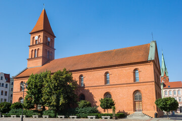 Fototapeta na wymiar Holy Trinity church on the market square of Torun, Poland