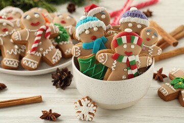 Delicious homemade Christmas cookies on white wooden table