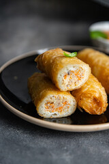 Nem asian food meat vegetable nems spicy sauce cuisine deep fried spring rolls fresh meal on the table copy space food background