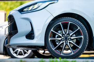 sports car wheels, low profile tires on aluminum rims, closeup