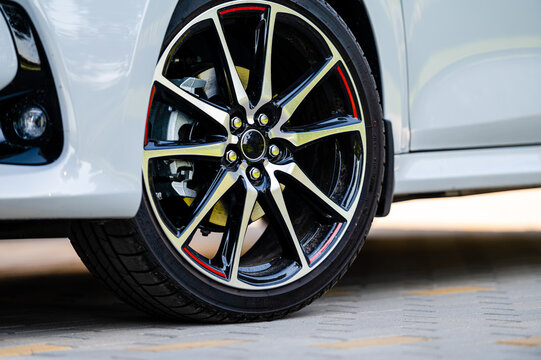 sports car wheels, low profile tires on aluminum rims, closeup