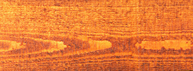 Naklejka premium Textured wooden brown backgroun.