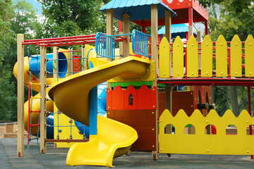 New colorful castle playhouse with slide on children's playground